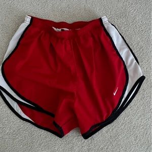 Red Nike shorts